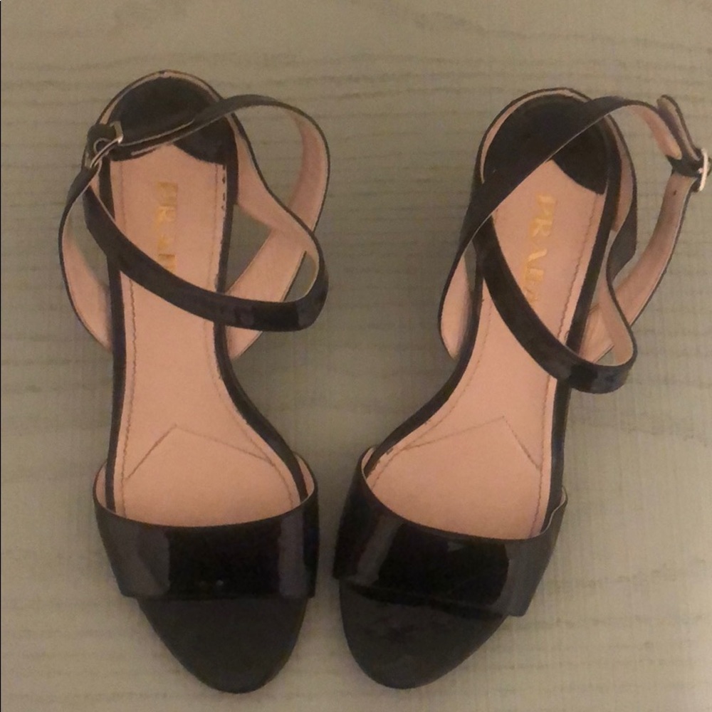 Black patent leather Prada wedges